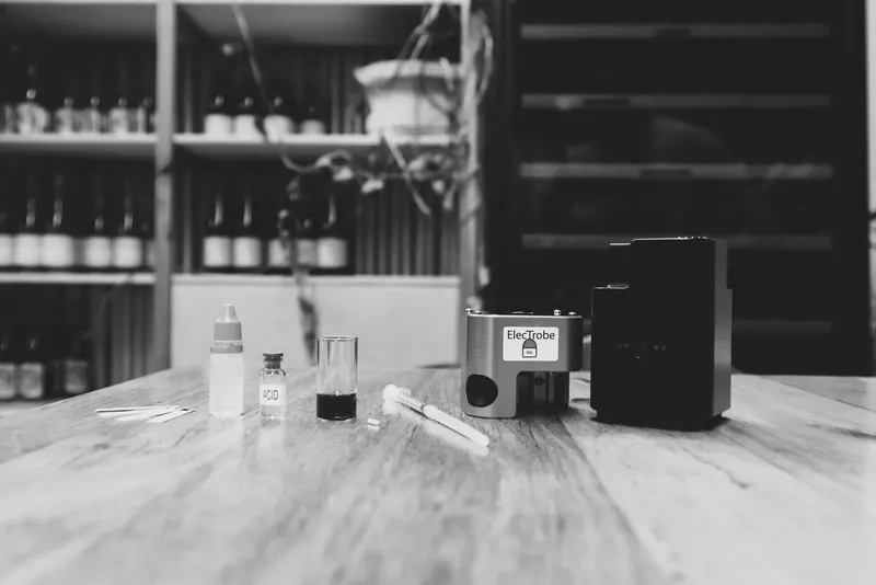 Black and white product photo of a testing kit