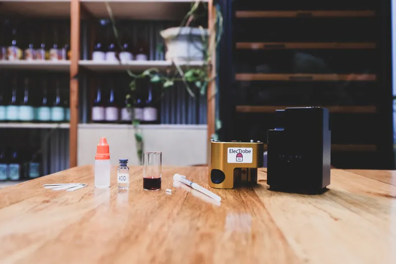 Product shoot of a testing kit on a timber bench