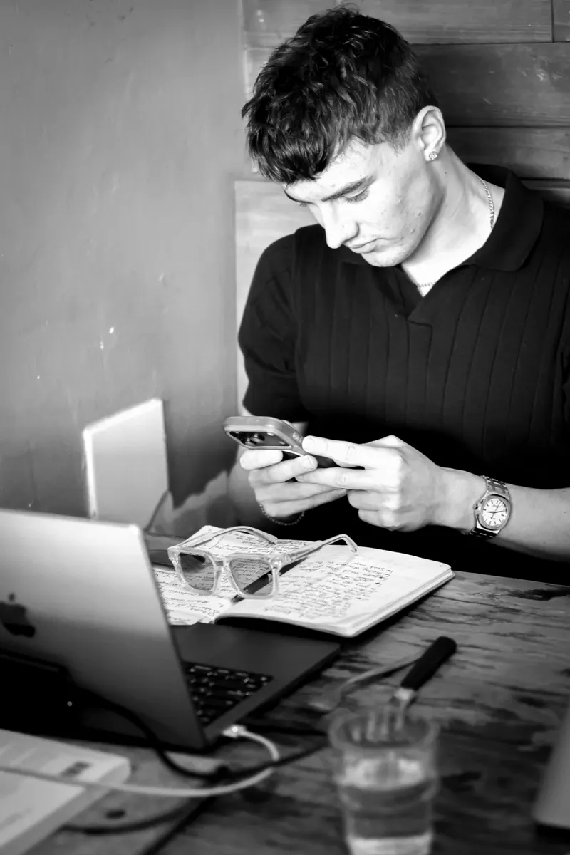 Working through a campaign on a laptop and phone